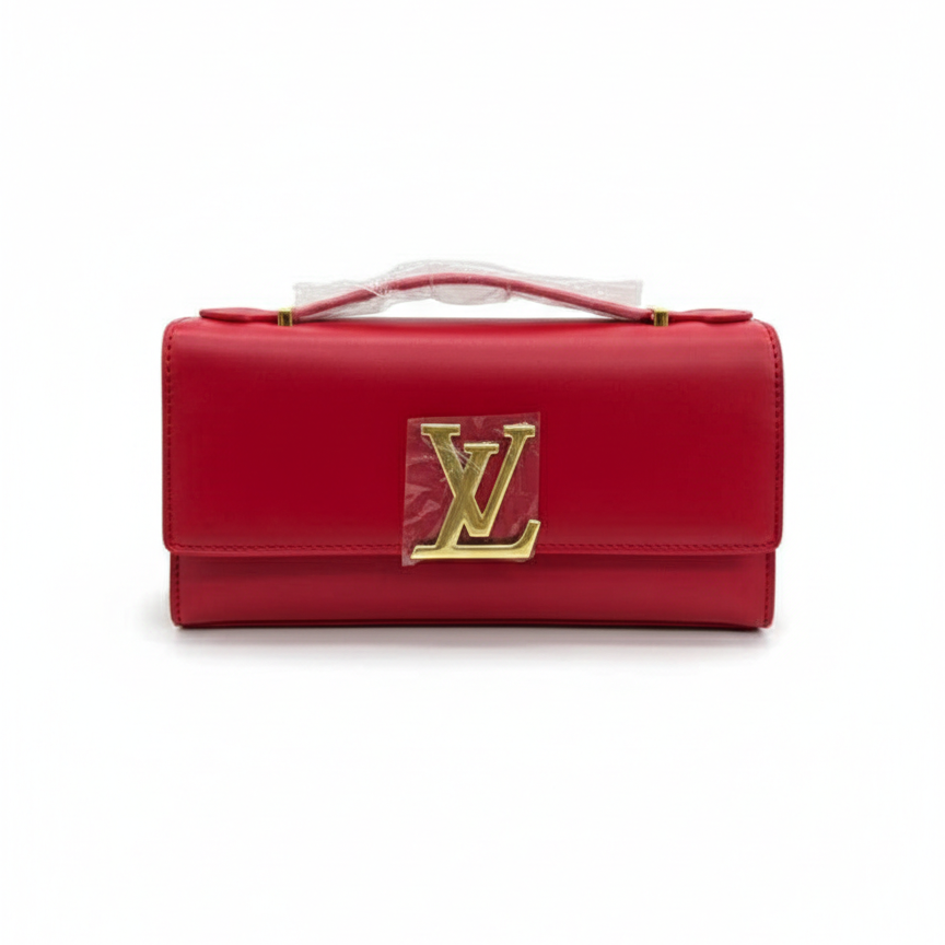 Red handbag with gold logo on a white background
